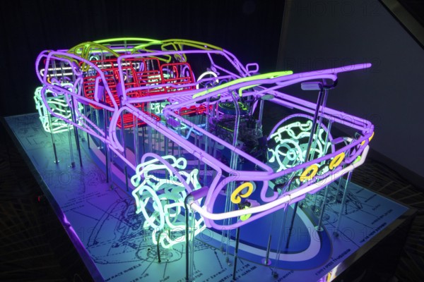 Detroit, Michigan USA - 14 January 2026 - A car made from neon glass tubing by artist Kory Sherer on display at the Detroit Auto Show