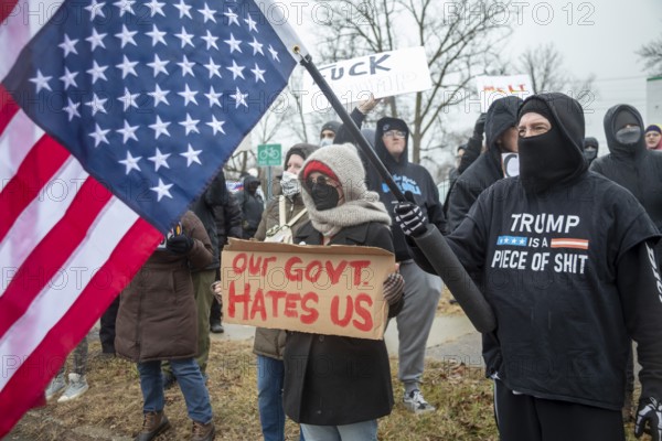 Detroit, Michigan USA - 13 January 2026 - Hundreds of protesters rallied in the rain outside the Motor City Casino as President Donald Trump spoke to the Detroit Economic Club inside