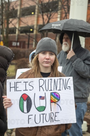 Detroit, Michigan USA - 13 January 2026 - Hundreds of protesters rallied in the rain outside the Motor City Casino as President Donald Trump spoke to the Detroit Economic Club inside