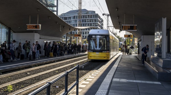 Berlin road traffic with buses, trams and pedestrians at and around the main train station, Berlin, Germany