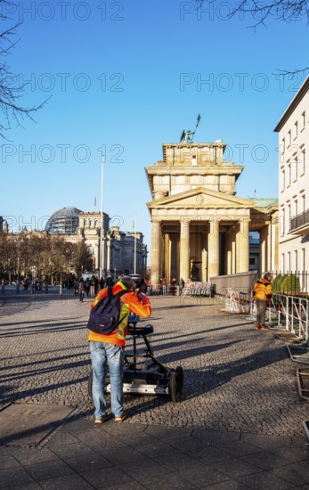 Measurement of the walkway at the Brandenburg Gate near the American Embassy, Berlin, Germany