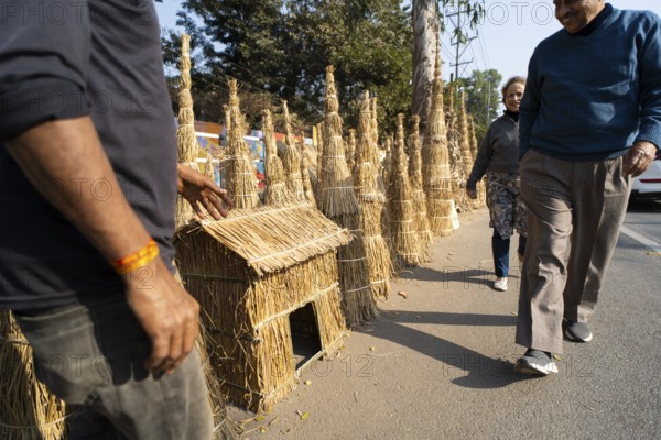 Vendor selling Meji (Bonfite), as part of preparations ahead of the 'Magh Bihu' festival, in Guwahati, Assam, India on January 12, 2026. Magh Bihu, also called Bhogali Bihu, is Assam's harvest festival marking the end of the agricultural season and celebrated with feasts, community bonfires, and traditional food