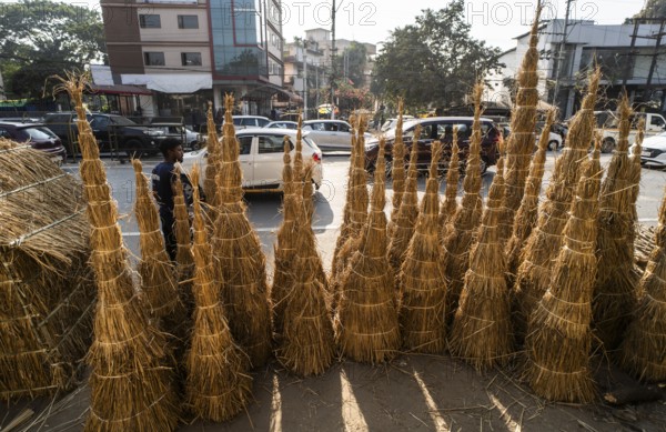 Vendor selling Meji (Bonfire), as part of preparations ahead of the 'Magh Bihu' festival, in Guwahati, Assam, India on January 12, 2026. Magh Bihu, also called Bhogali Bihu, is Assam's harvest festival marking the end of the agricultural season and celebrated with feasts, community bonfires, and traditional food