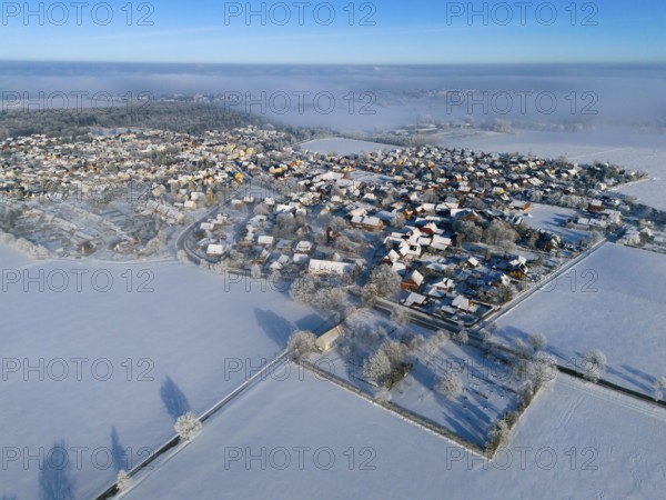 Snowy village nestled in white fields under a clear sky from a bird's eye view, aerial view, partly fog, Bülten, Ilsede, Lower Saxony, Germany