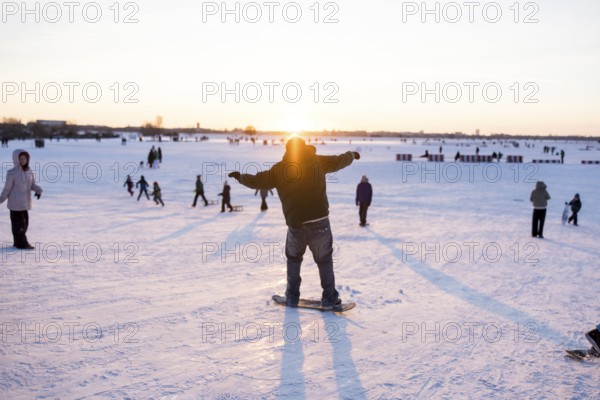 An athlete rides down the toboggan hill on Tempelhofer Feld in Berlin on 11.01.2026