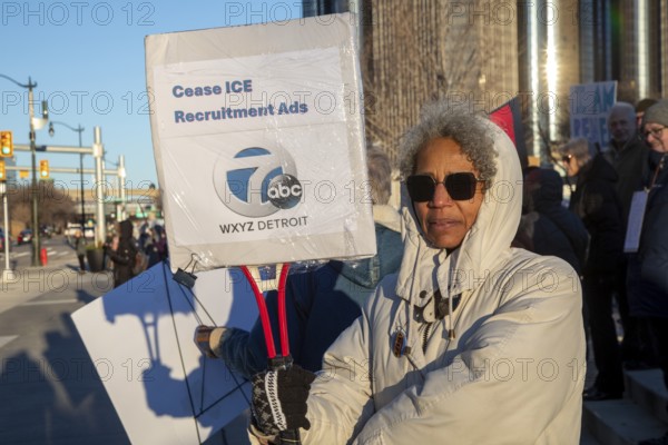 Detroit, Michigan USA - 11 January 2026 - A protest organized by Indivisible Michigan protested the killing of Renee Nichole Good in Minneapolis by a federal immigration agent. One protester carried a sign calling for the local ABC affiliate to stop running recruitment ads for ICE
