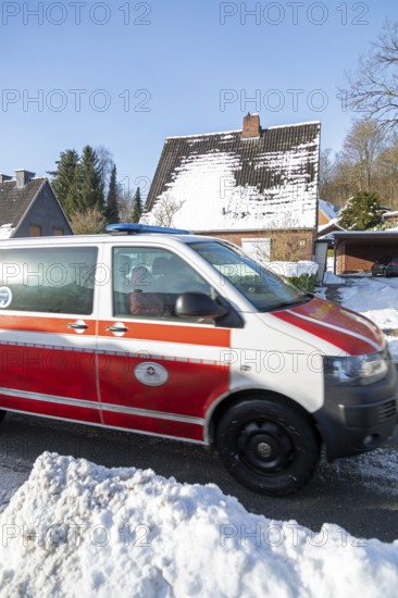 Snowy road, ambulance, houses, winter, snow, Sieversen, Samtgemeinde Rosengarten, Lower Saxony, Germany