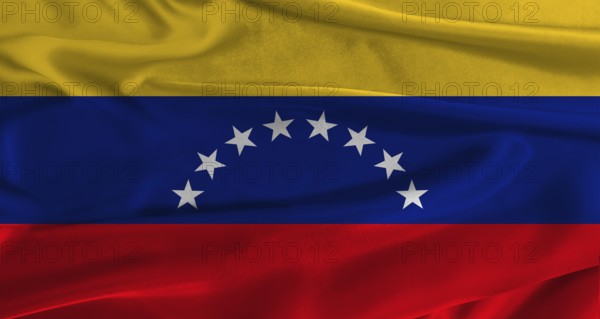 Flag of Venezuela with fabric textured background. Close up of National flag of Venezuela with realistic texture
