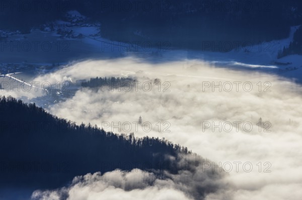 View of a sea of fog from Vormauerstein, Strobl am Wolfgangsee, church tower sticking out of the fog, inversion weather, Osterhorn Group, Salzkammergut, Province of Salzburg, Austria