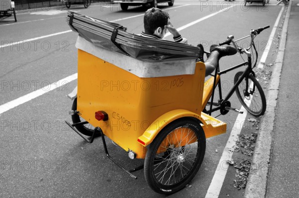 Rickshaw driver waiting at Central Park, New York City, USA
