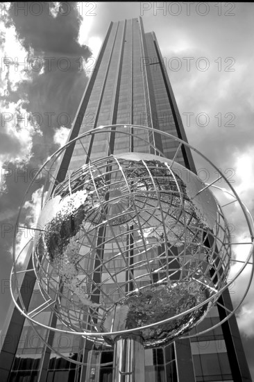 Globe sculpture in front of the Trump International Hotel in Central Park, black and white, New York City, USA