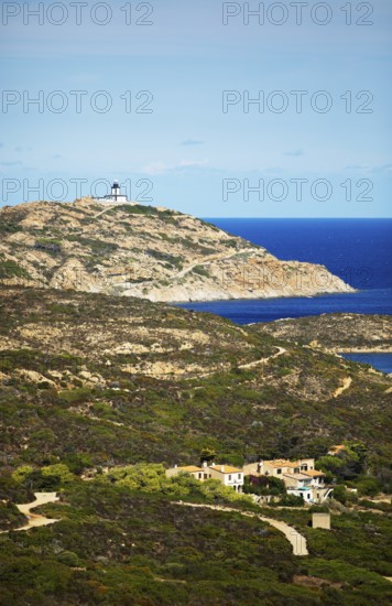 Coast at Punta de la Revellata, behind the lighthouse, Calvi, Haute Corse Department, Corsica, France