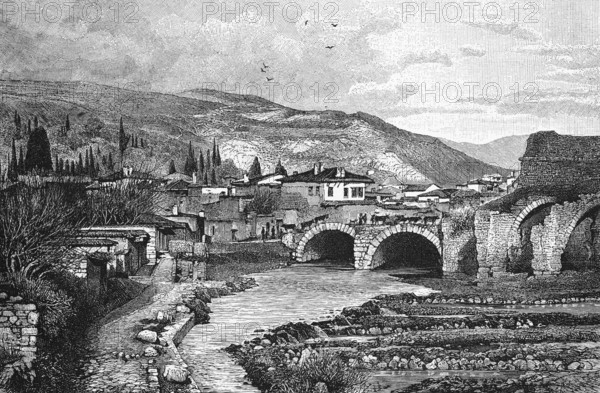 City view of Pergamon, Mysia, Turkey, small Asian town with historical past, Kaïkos river, stone bridge, ancient ruins, mountain landscape, historical illustration 1888