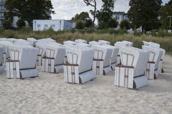 Beach chairs set up for transport to winter quarters, sandy beach, Baltic Sea, Binz, seaside resort, Rügen island, Mecklenburg-Western Pomerania, Germany