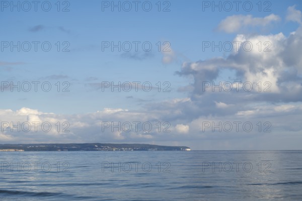 View across the Baltic Sea towards the chalk coast, sky with white clouds, Binz, seaside resort, Rügen island, Mecklenburg-Western Pomerania, Germany