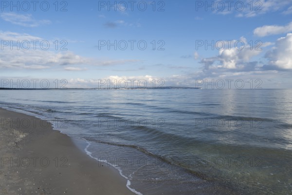 View across the Baltic Sea towards chalk coast, beach, sky with white clouds, Binz, seaside resort, island of Rügen, Mecklenburg-Western Pomerania, Germany