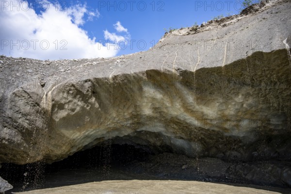 Meltwater at a glacier cave, underground glacier stream, Castner Glacier, Delta Range, Alaska Range, Richardson Highway, Alaska, USA