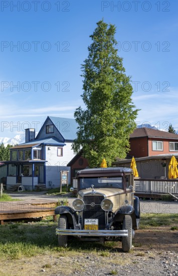 Vintage car and historic building, McCarthy, Wrangell St. Elias National Park, Alaska, USA