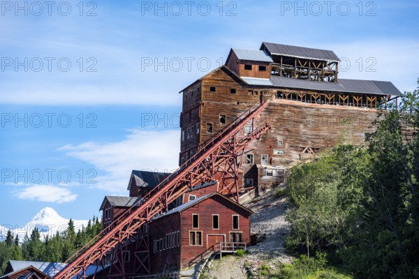 Red dilapidated buildings of Kennicott, Kennicott Concentration Mill to extract copper from quarried rock, Historic Kennecott Copper Mine, National Historic Landmark, Wrangell St. Elias National Park, Alaska, USA