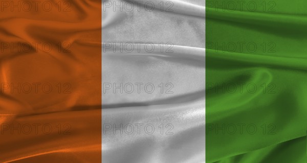 Flag of Ivory Coast with fabric textured background. Close up of National flag of Ivory Coast with realistic texture