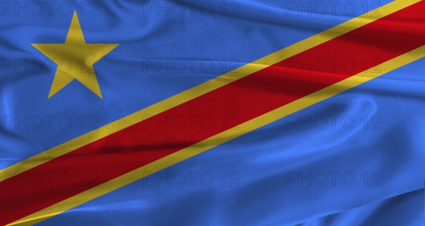 Flag of the Democratic Republic of the Congo with fabric textured background. Close up of National flag of the Democratic Republic of the Congo with realistic texture