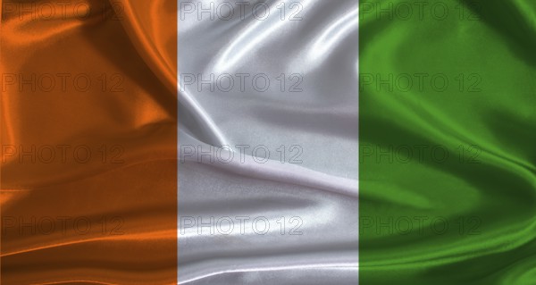 Ivory Coast flag with cloth textured background. National flag of Ivory Coast with realistic texture