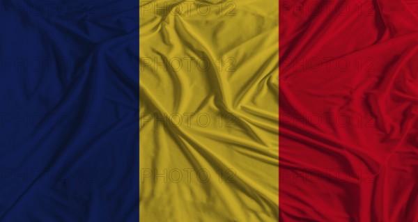 Chad flag with fabric texture background. National flag of Chad with cloth texture