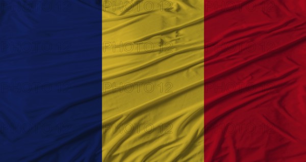 Chadian flag waving. Flag of Chad with cloth texture