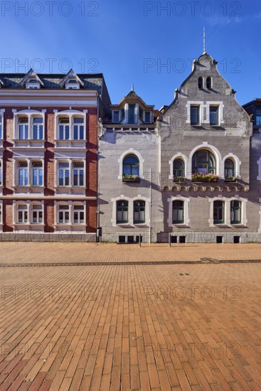 Historic residential buildings, façade with windows, gables and tail gables, paving street, blue sky, cirrus clouds, Frau-Clara-Straße, Eckernförde, Rendsburg-Eckernförde district, Schleswig-Holstein, Germany