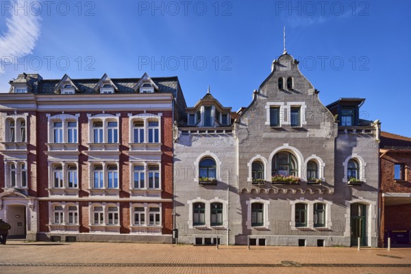 Historic residential buildings, façade with windows, gables and tail gables, paving street, blue sky, cirrus clouds, Frau-Clara-Straße, Eckernförde, Rendsburg-Eckernförde district, Schleswig-Holstein, Germany