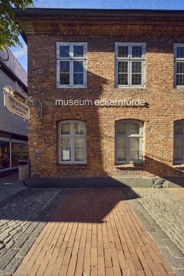 Eckernförde Museum, pedestrian zone, brick building, façade with windows, paving and paving stones walkway, sunny, blue sky, access from Rathausmarkt, Kieler Straße, Eckernförde, Rendsburg-Eckernförde district, Schleswig-Holstein, Germany