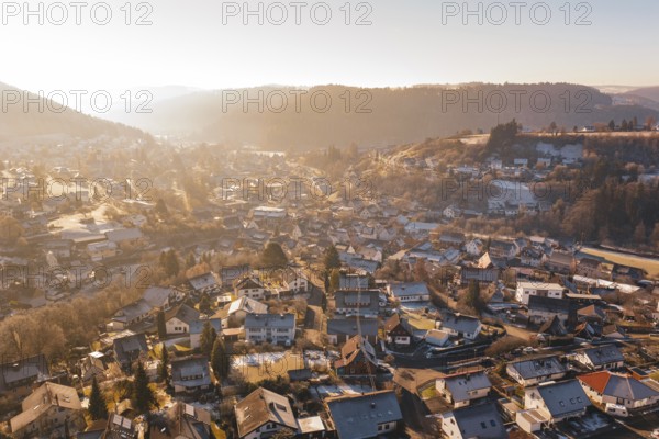 Wintery village view with a clear view of the surrounding area, Glatten, Freudenstadt district, Germany