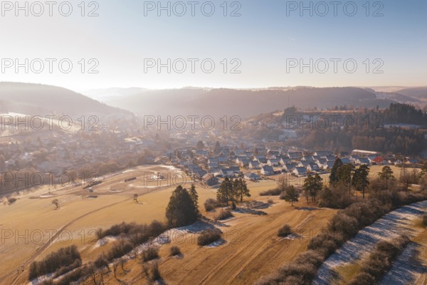 A quiet winter landscape with village and fields, Glatten, Freudenstadt district, Germany