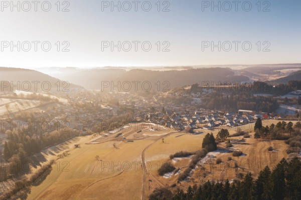 Large winter landscape with village and sunny sky, Glatten, Freudenstadt district, Germany