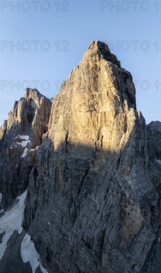 Aerial view, alpine panorama, Cima Tosa and rocky peaks at sunrise with alpine glow, picturesque mountain landscape, Brenta Dolomites, Trentino, Italy