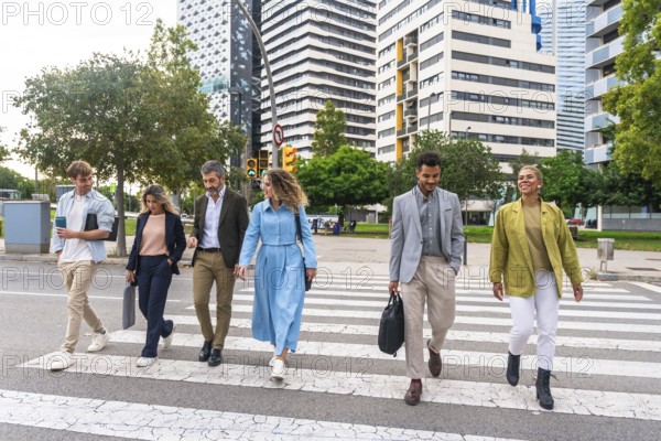 Group of multi ethnic business professionals collaborating and walking across a zebra crossing in a modern city, representing teamwork, urban lifestyle, and professional success