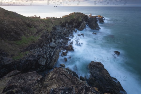 Sunset with wide view over the east coast at Cape Byron, New South Wales, Australia