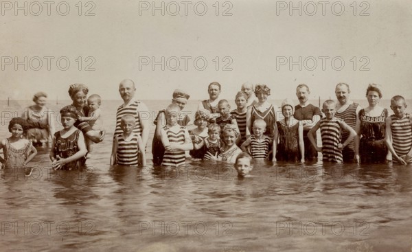 Digitally restored historical photograph of a group of bathers in the Baltic Sea near Göhren on the island of Rügen, taken around 1924, Germany