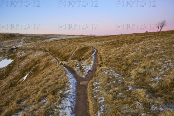 Fork in wintry hills under a blue and pink sky, La Gorge de Pierrel, Martinswand, Frankental, Vosges, France