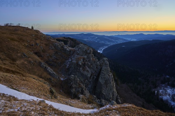 Rocky elevation with wide horizon at sunset, looking towards the Rhine Valley, viewpoint, La Gorge de Pierrel, Martinswand, Frankental, Vosges, France