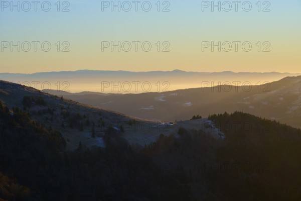 Sunrise over mountain landscape with rolling hills, fog and thick forests, morning, view, Rhine Valley, Martinswand, Frankental, Vosges, France