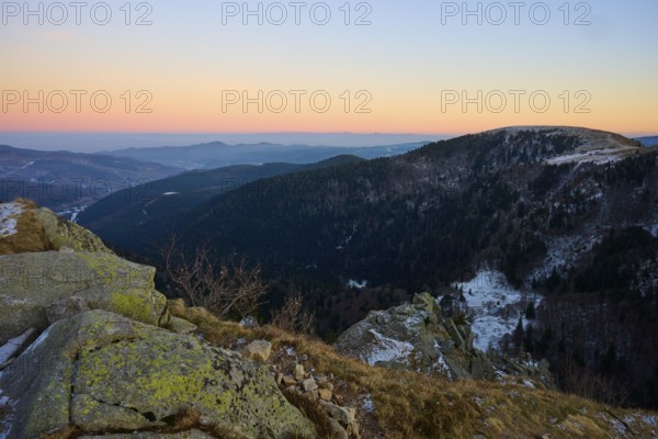 View of dark forests and hills at sunset, looking towards the Rhine Valley, viewpoint, La Gorge de Pierrel, Martinswand, Frankental, Vosges, France