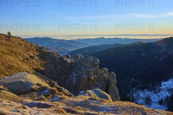 Quiet mountain landscape with rocks in the foreground and blue sky in the background, view of the Rhine Valley, viewpoint, La gorge de Pierrel, Martinswand, Frankental, Vosges, France