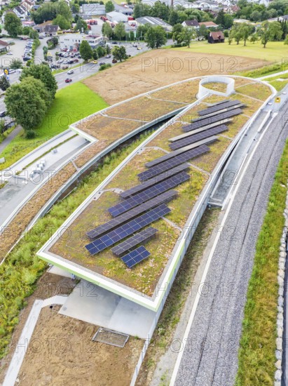 Roof with solar systems near roads and train lines, nestled in nature, new park and ride parking garage Calw Heumaden on the new Hermann Hessebahn, Calw, Germany