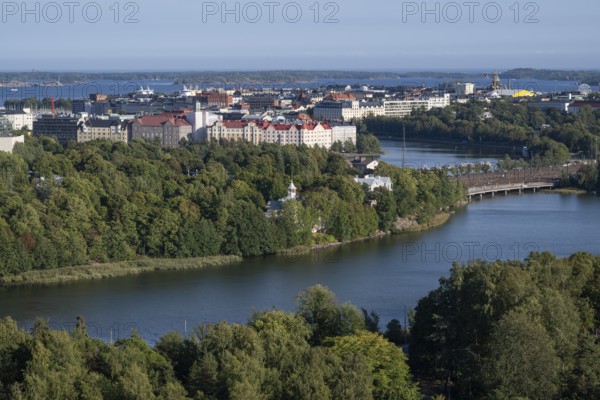 View from the Olympic Stadium tower over forest and lakes Töölönlahti and Eläintarhanlahti of downtown Helsinki, Finland