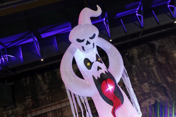 Illuminated ghost figure at Halloween Run, night run in the Dusiburg-Nord Landscape Park, Duisburg, Germany, North Rhine-Westphalia, Germany