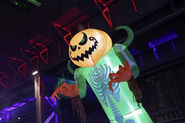 Illuminated scary figure at Halloween Run, night run in the Duisburg-Nord Landscape Park, Duisburg, Germany, North Rhine-Westphalia, Germany