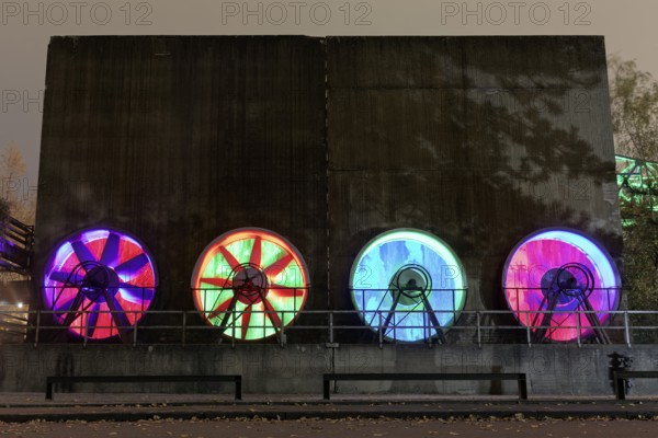 Four colour-illuminated fans at the cooling plant of the former steelworks, Landschaftspark Duisburg-Nord, Duisburg, Germany, North Rhine-Westphalia, Germany