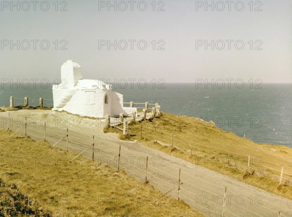 Historic listed building, Huer's Hut, a hermitage and lighthouse, Towan Headland, Newquay, Cornwall, England, UK 1960s