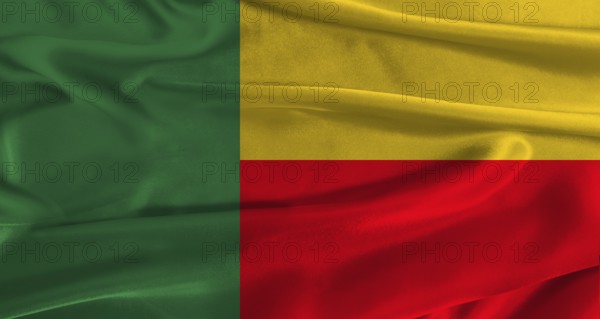 Flag of Benin with fabric textured background. Close up of National flag of Benin with realistic texture